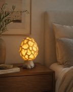 Morchella lamp on bedside table