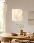 Arya pendant lamp above a dining table