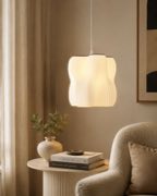 Arya pendant lamp in a reading corner
