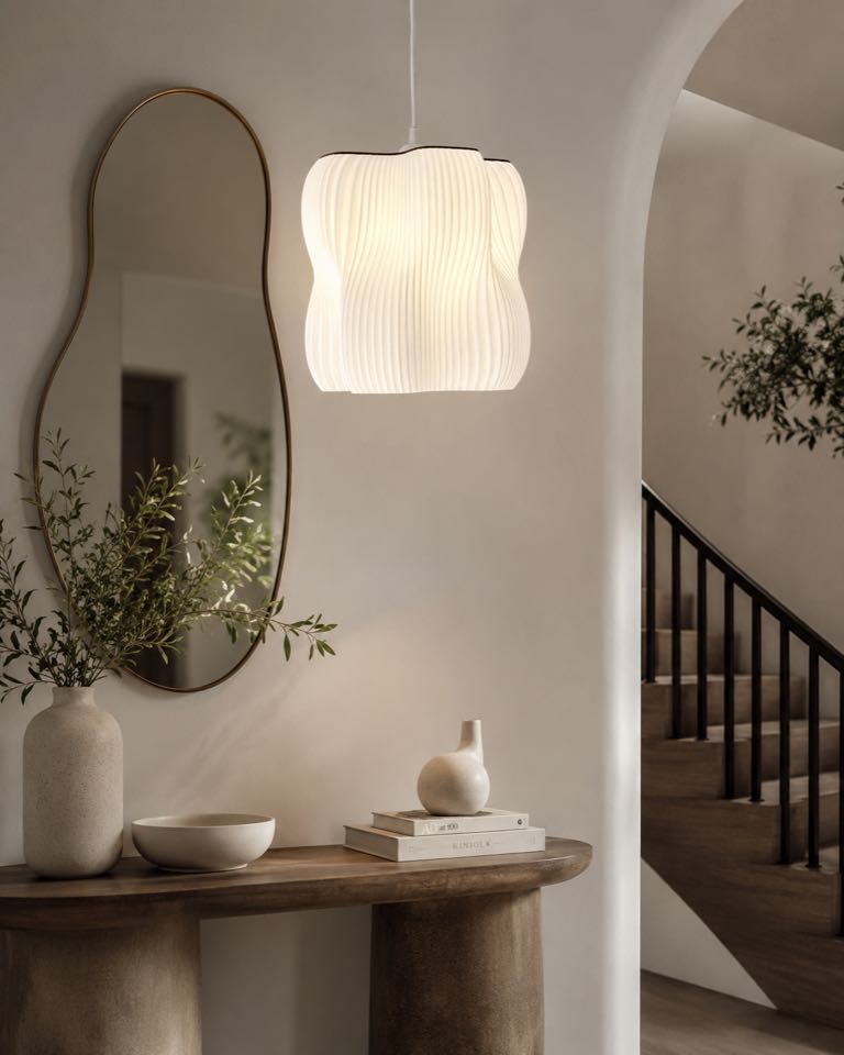 Arya pendant lamp near an entryway mirror