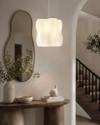 Arya pendant lamp near an entryway mirror